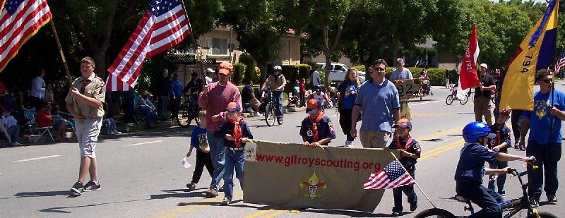Picture of Troop 792 and Pack 794 marching in the Gilroy Memorial Day Parade